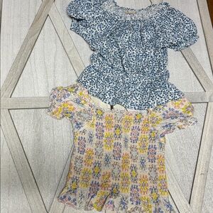 Girl’s Peasant Tops
1 blue and white floral top
1 multicolored floral top